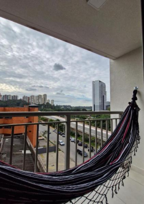 Por do sol desde uma rede na varanda da zona sul